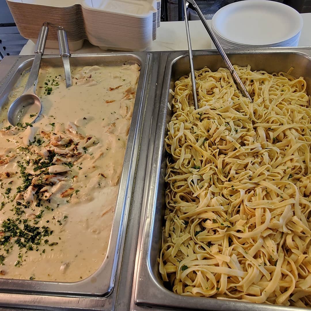 Chicken Alfredo with Caesar salad and Garlic Bread | Chefs Café
